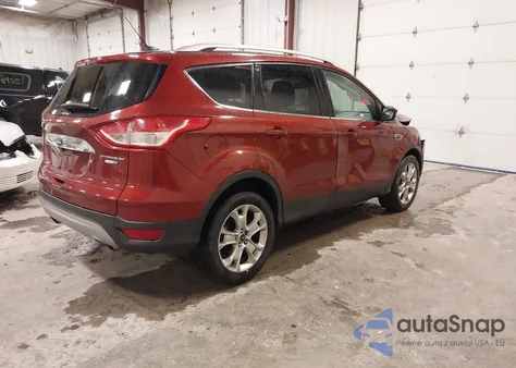 2016 Ford Escape Titanium z USA, uszkodzony, nr VIN 1FMCU9JX0GUC65615